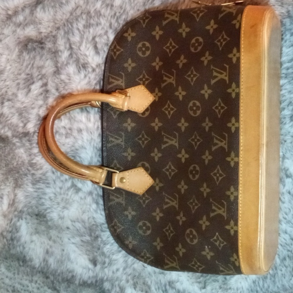 Louis Vuitton Alma comes with Authentication Certificate